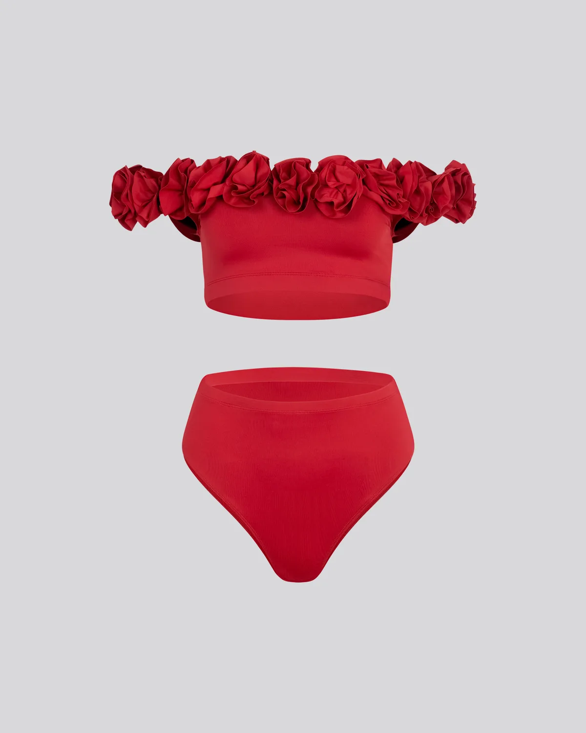 Packshot maillot de bain rouge à fronces sur fond neutre